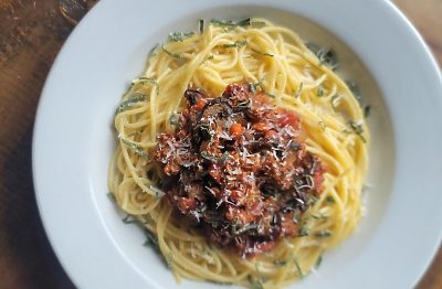 Baked pasta dish with cheese and breadcrumbs